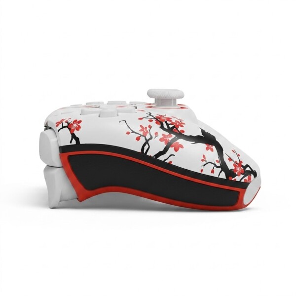 Manette PS5 personnalise Coques interchangeables : Remplacement de la face avant et arrière par des motifs complexes (ex. : thème Manga, style bois ou graffiti) ou des textures mates, chromées et holographiques.
